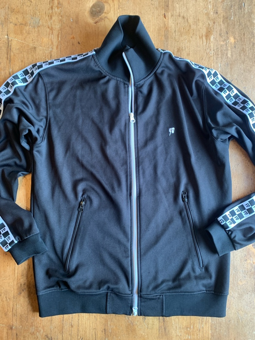 10.Deep Black Track Bomber Jacket with White Accent Tape